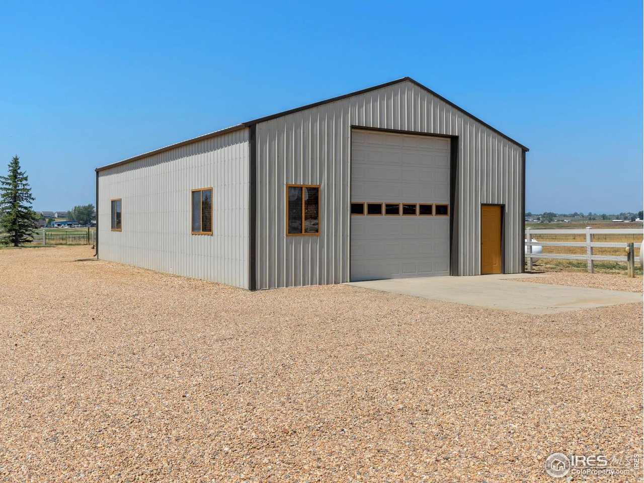 13581 Elmore Road Longmont, CO 80504 - Photo 25 of 34 Shop/RV storage with a 16' door