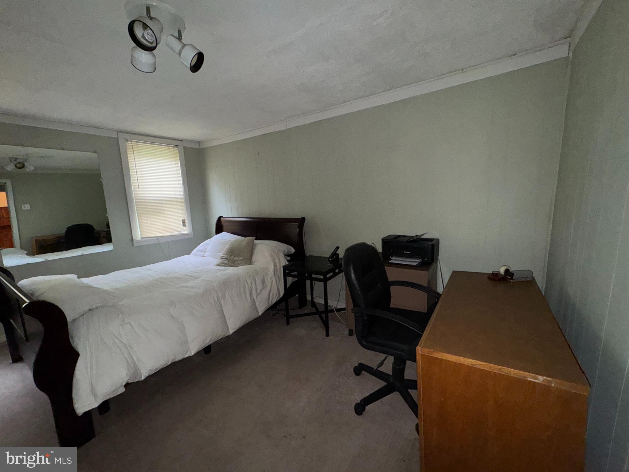 13 Cramer Road Tabernacle, NJ 08088 - Photo 41 of 48 a bedroom with a bed with desk and chair
