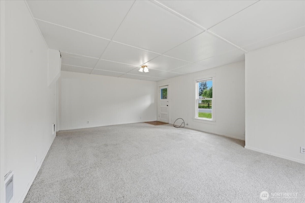 23746 Old Day Creek Road, Unit A & B Sedro-Woolley, WA 98284 - Photo 7 of 36 an empty room with windows and mirror