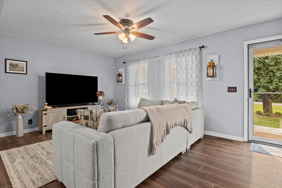 5790 Washer Road Lyles, TN 37098 - Photo 12 of 31 a living room with furniture and a flat screen tv