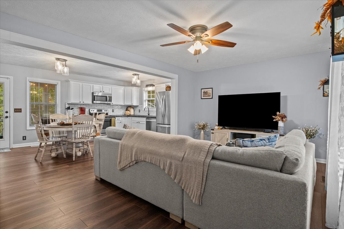 5790 Washer Road Lyles, TN 37098 - Photo 13 of 31 a living room with furniture and a flat screen tv