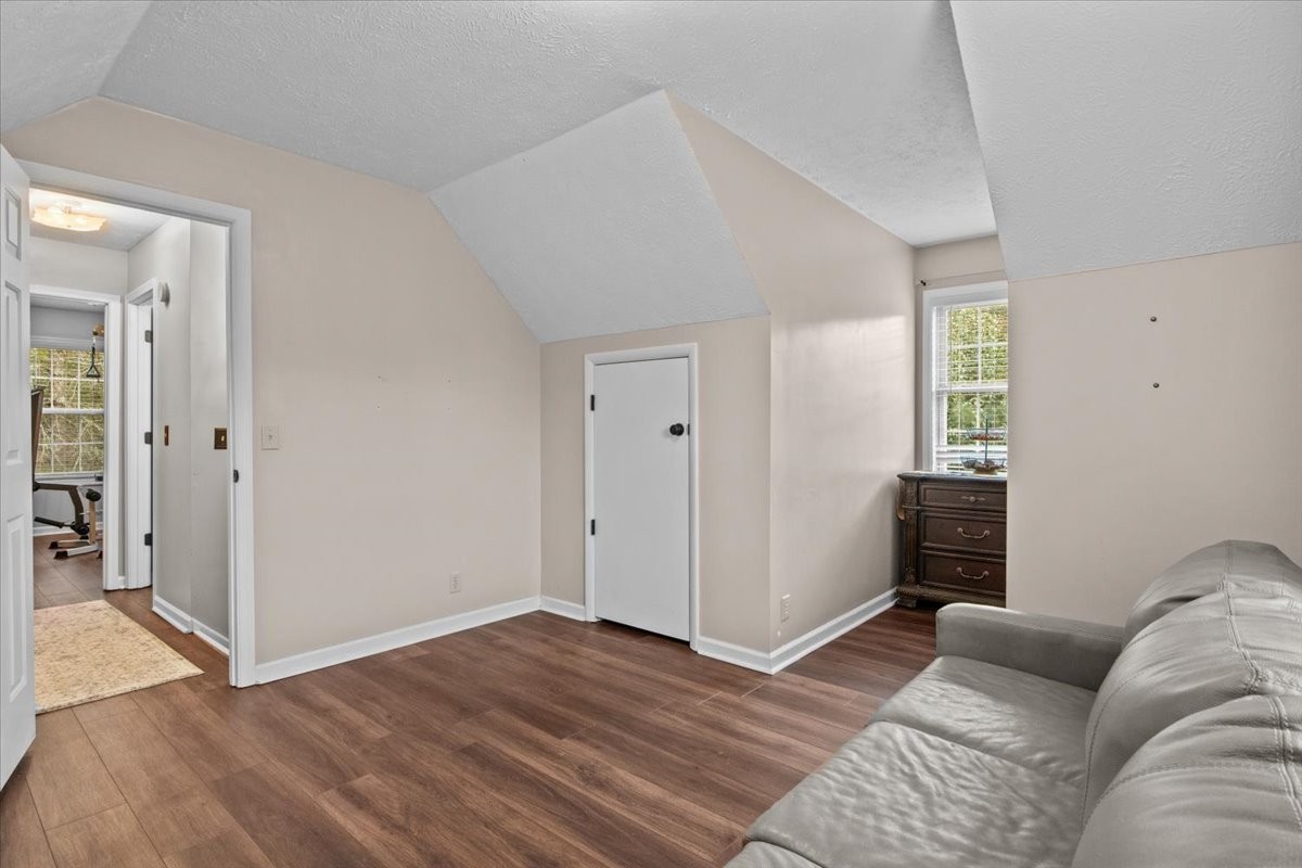 5790 Washer Road Lyles, TN 37098 - Photo 28 of 31 a living room with furniture and a window