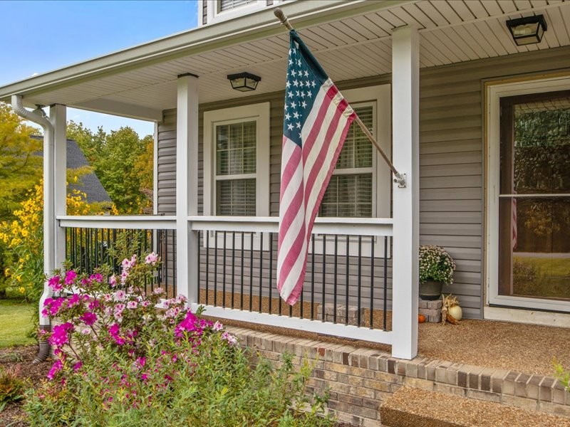 5790 Washer Road Lyles, TN 37098 - Photo 7 of 31 a front view of a house with a porch