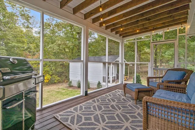 a living room with furniture and a window