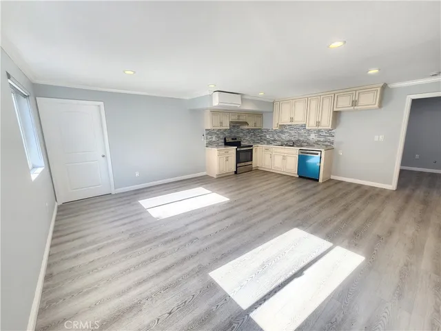 a view of kitchen with wooden floor