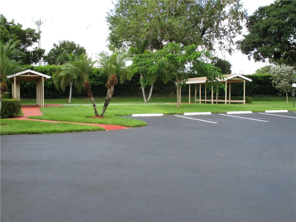 8897 Echo Lane, Unit D Boca Raton, FL 33496 - Photo 27 of 32 Exterior sitting area
