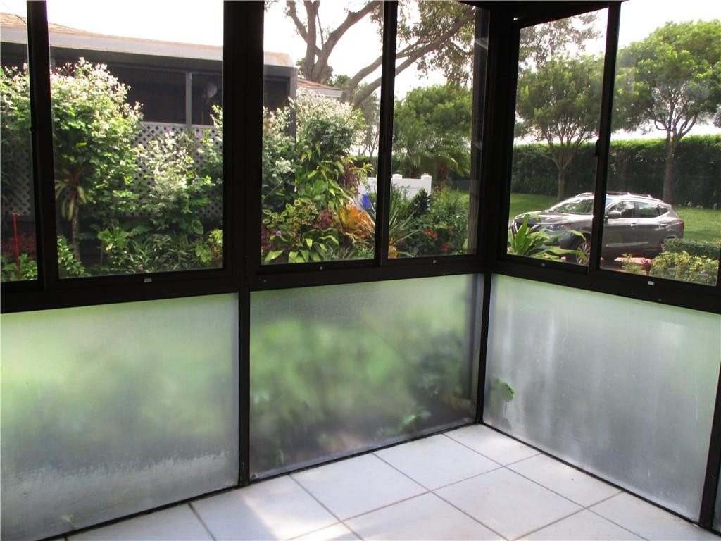 8897 Echo Lane, Unit D Boca Raton, FL 33496 - Photo 6 of 32 Screened/enclosed patio