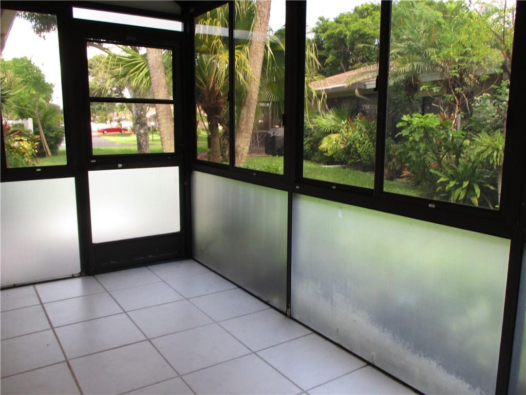 8897 Echo Lane, Unit D Boca Raton, FL 33496 - Photo 7 of 32 Screened/enclosed patio