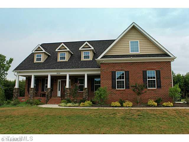 9002 Sedwick Way Oak Ridge, NC 27310 - Photo 1 of 16 Exterior Front.