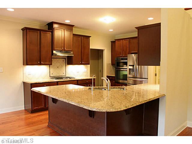 9002 Sedwick Way Oak Ridge, NC 27310 - Photo 3 of 16 Kitchen.