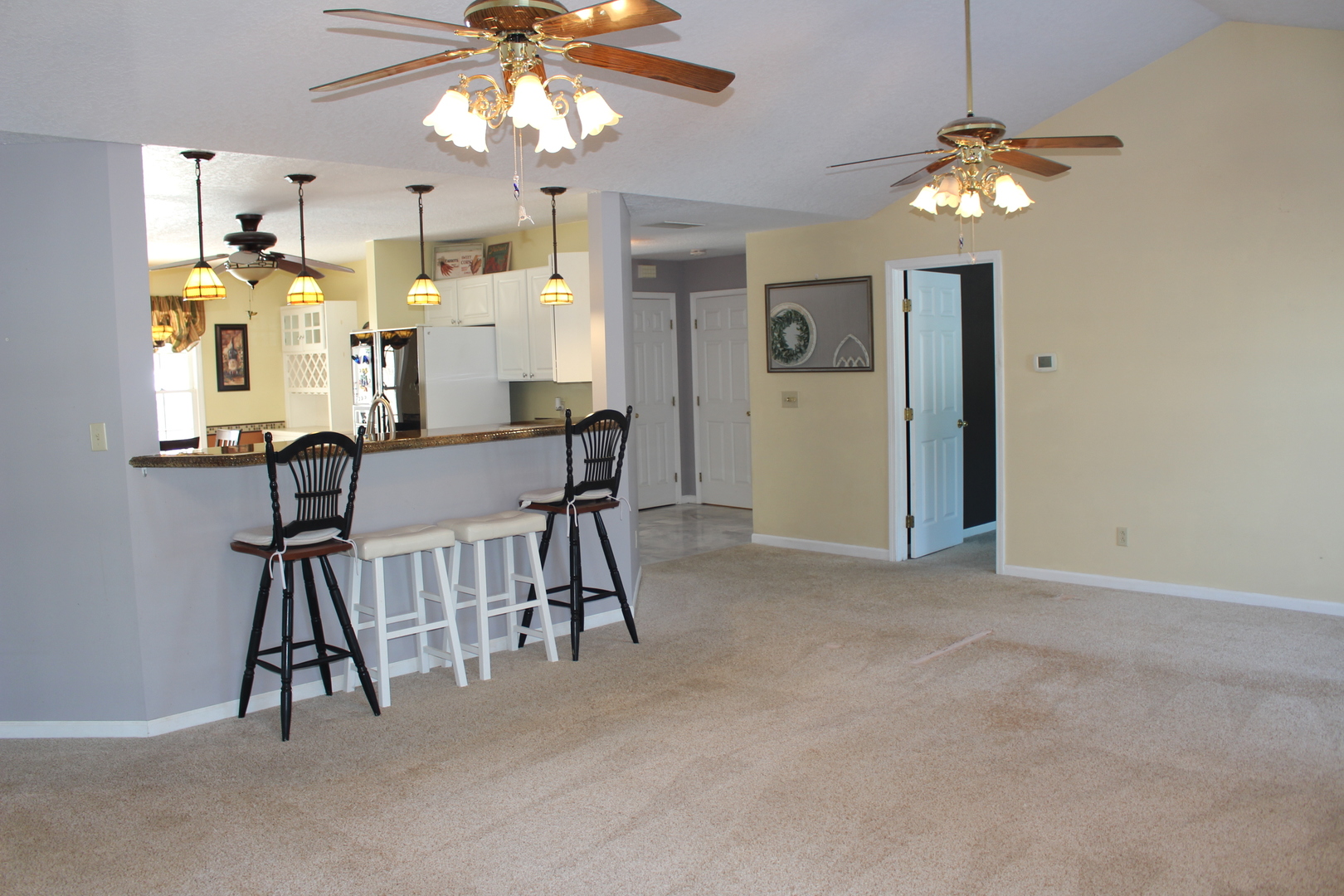 7629 White Oak Road Clinton, IL 61727 - Photo 18 of 47 a view of a dining room with furniture and chandelier fan
