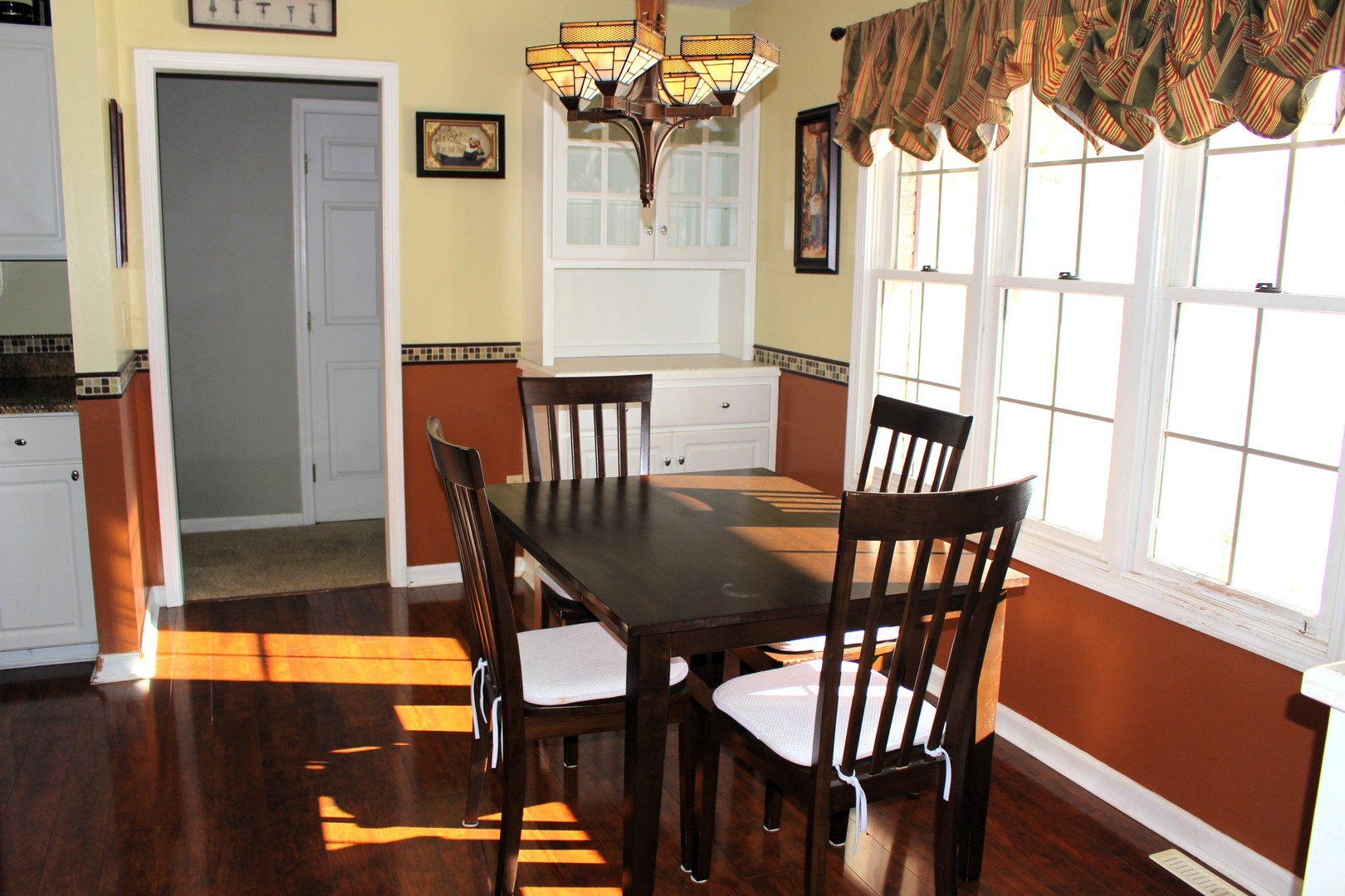 7629 White Oak Road Clinton, IL 61727 - Photo 26 of 47 a view of a dining room with furniture and window