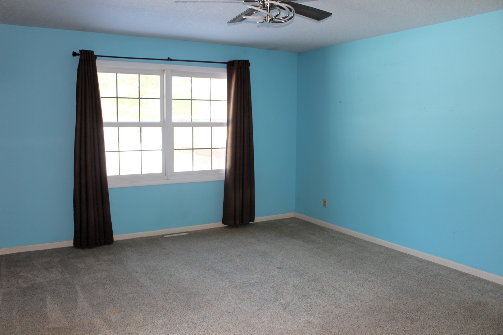 7629 White Oak Road Clinton, IL 61727 - Photo 35 of 47 an empty room with a window