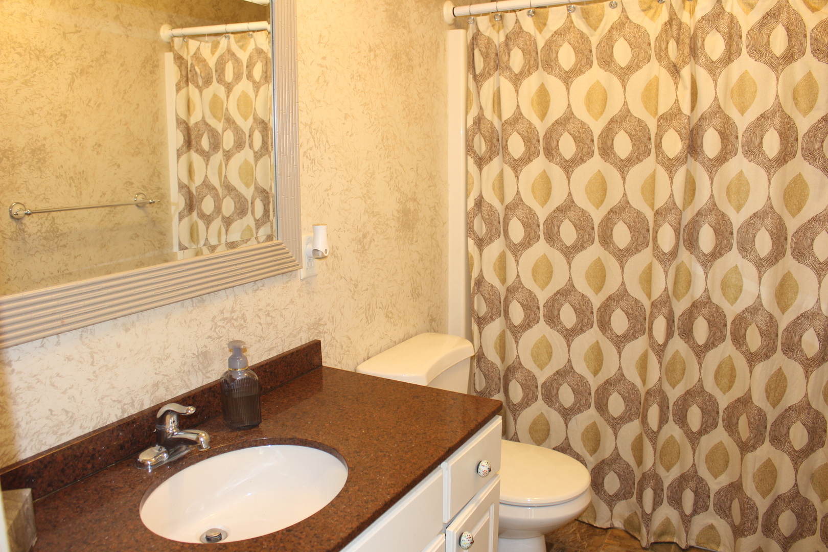 7629 White Oak Road Clinton, IL 61727 - Photo 44 of 47 a bathroom with a granite countertop toilet and a sink