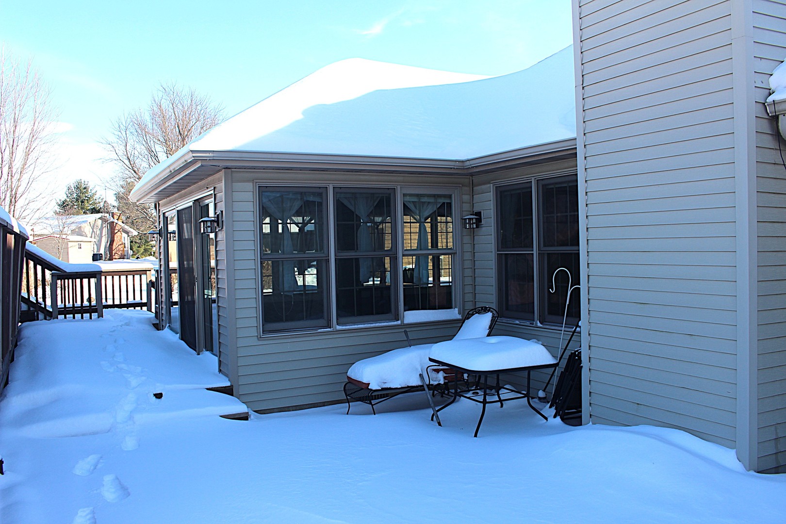 7629 White Oak Road Clinton, IL 61727 - Photo 6 of 47 a front view of a house with a glass door
