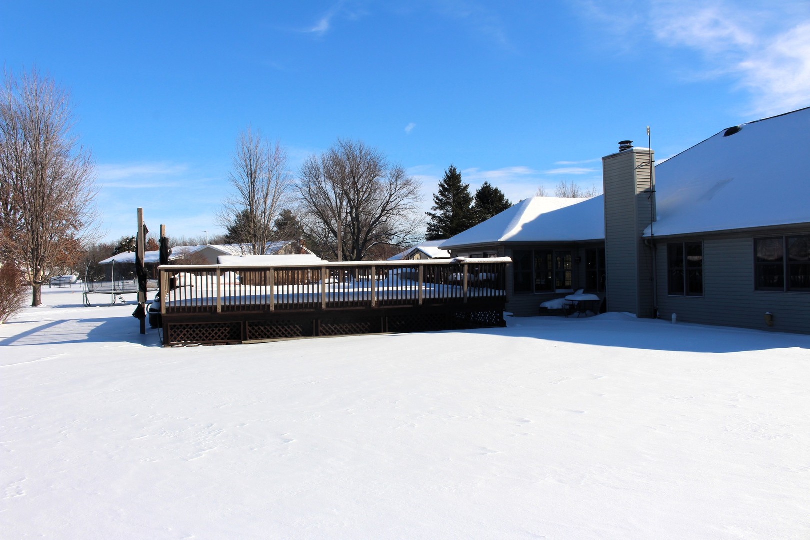 7629 White Oak Road Clinton, IL 61727 - Photo 8 of 47 a swimming pool with outdoor seating and yard