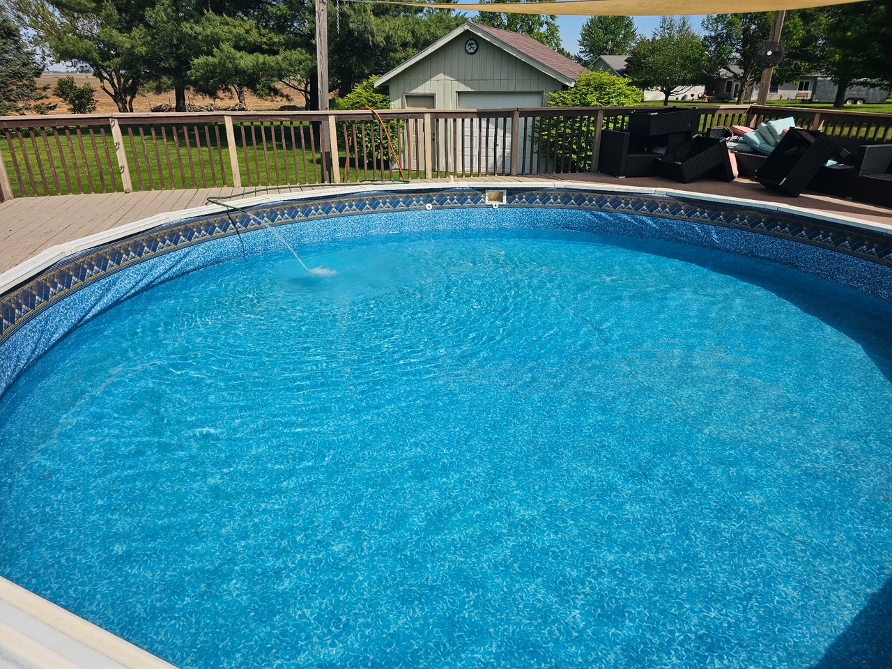 7629 White Oak Road Clinton, IL 61727 - Photo 10 of 47 a view of a house with a wooden deck