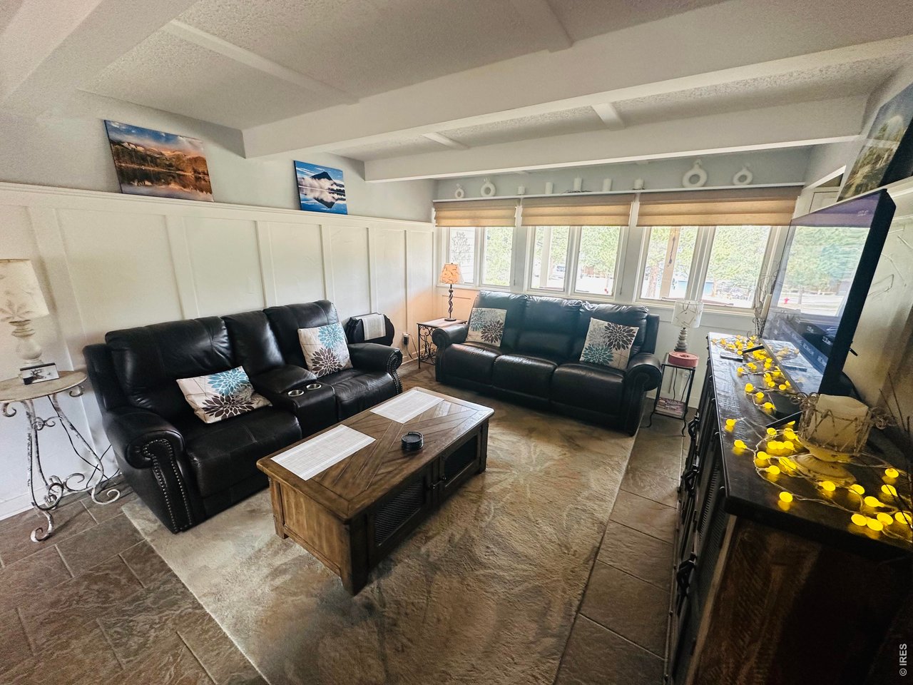 820 Riverside Drive Estes Park, CO 80517 - Photo 12 of 43 Settle into the living room