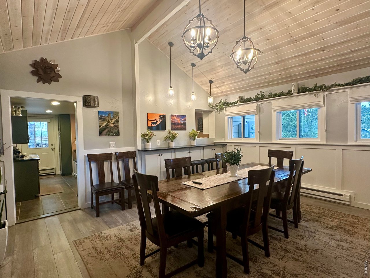 820 Riverside Drive Estes Park, CO 80517 - Photo 22 of 43 Pass through window to kitchen and lots of windows!