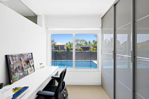 a room with a table and chairs