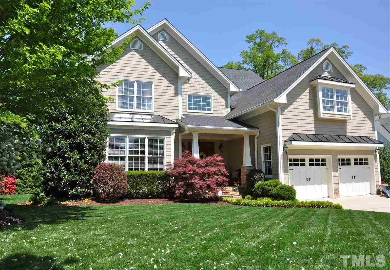 3400 Harden Road Raleigh, NC 27607 - Photo 1 of 25 a front view of a house with garden