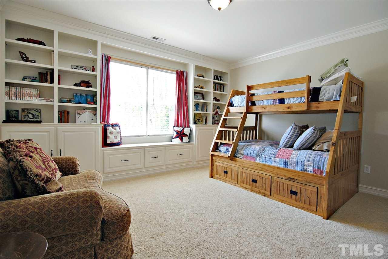 3400 Harden Road Raleigh, NC 27607 - Photo 16 of 25 a bedroom with furniture and a large window