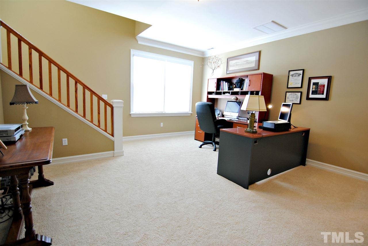 3400 Harden Road Raleigh, NC 27607 - Photo 18 of 25 a room with furniture and a window