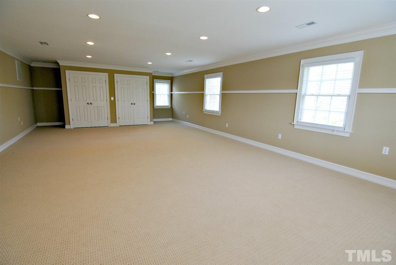 3400 Harden Road Raleigh, NC 27607 - Photo 20 of 25 an empty room with a empty space and windows