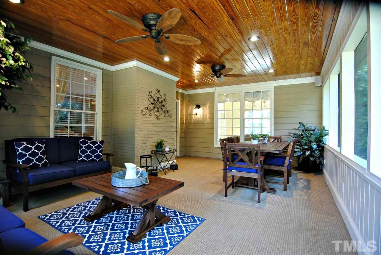 3400 Harden Road Raleigh, NC 27607 - Photo 22 of 25 a living room with furniture and a large window