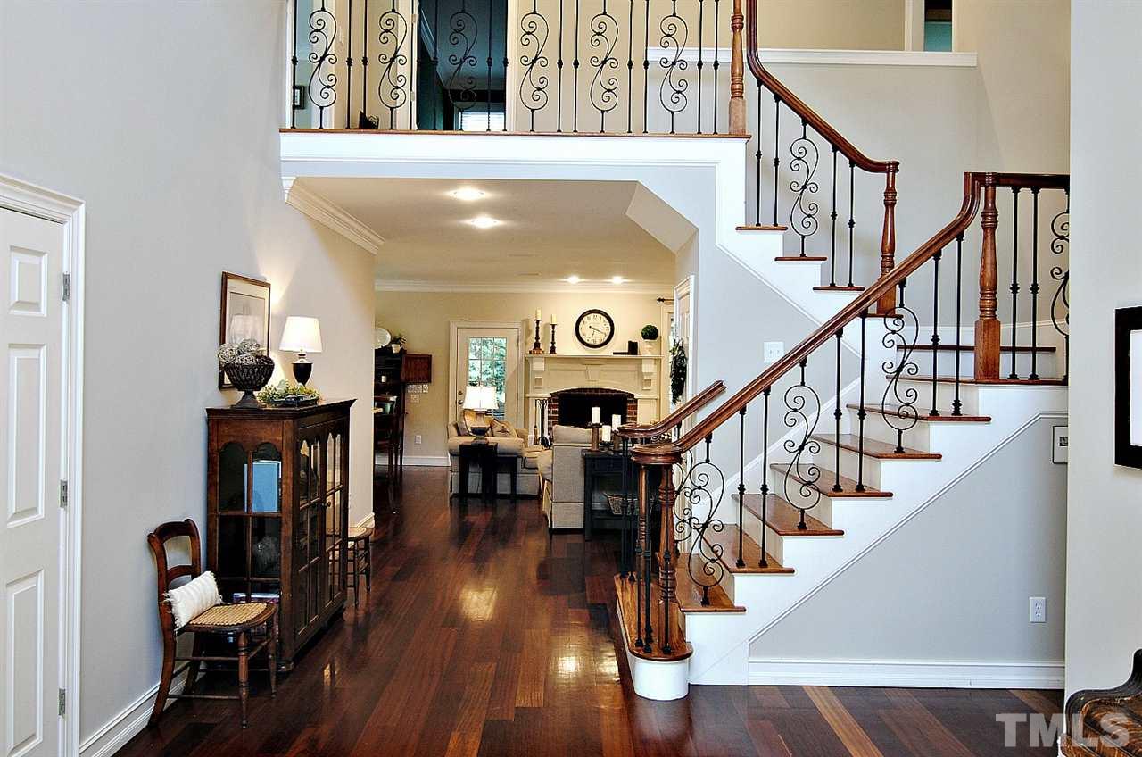 3400 Harden Road Raleigh, NC 27607 - Photo 4 of 25 a view of entryway and hall with wooden floor