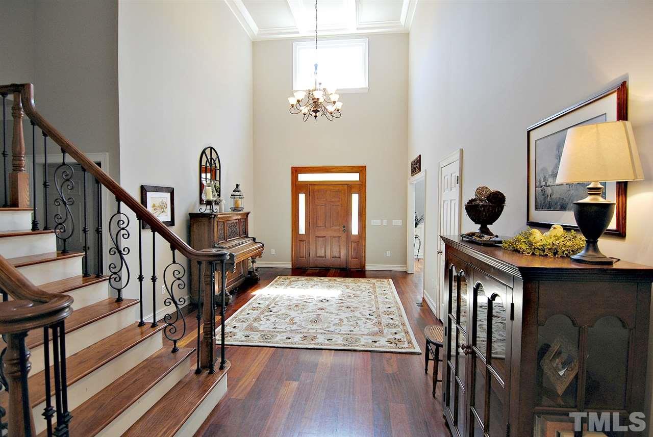 3400 Harden Road Raleigh, NC 27607 - Photo 5 of 25 a living room with furniture and a wooden floor