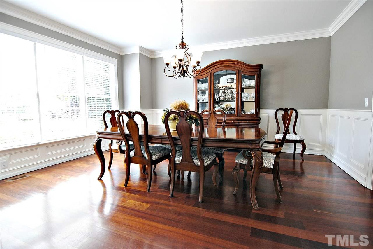 3400 Harden Road Raleigh, NC 27607 - Photo 6 of 25 a view of a dining room with furniture window and wooden floor