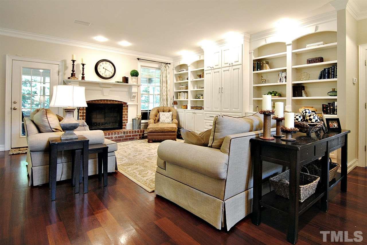 3400 Harden Road Raleigh, NC 27607 - Photo 8 of 25 a living room with furniture and a fireplace