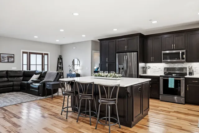 a room with furniture and a flat screen tv