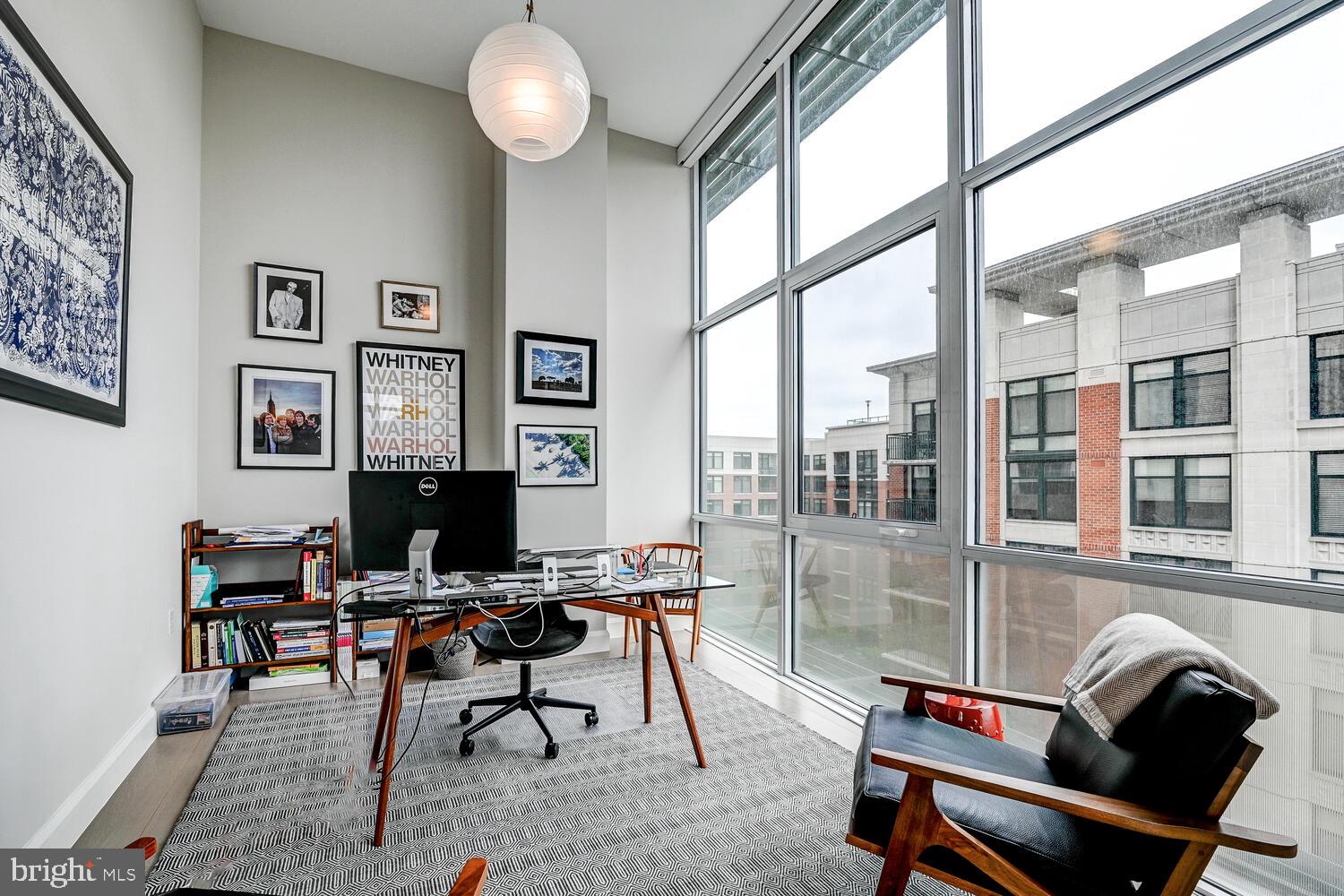 1330 Lancaster Street, Unit C901 Baltimore, MD 21231 - Photo 18 of 55 a view of a workspace with furniture and a window