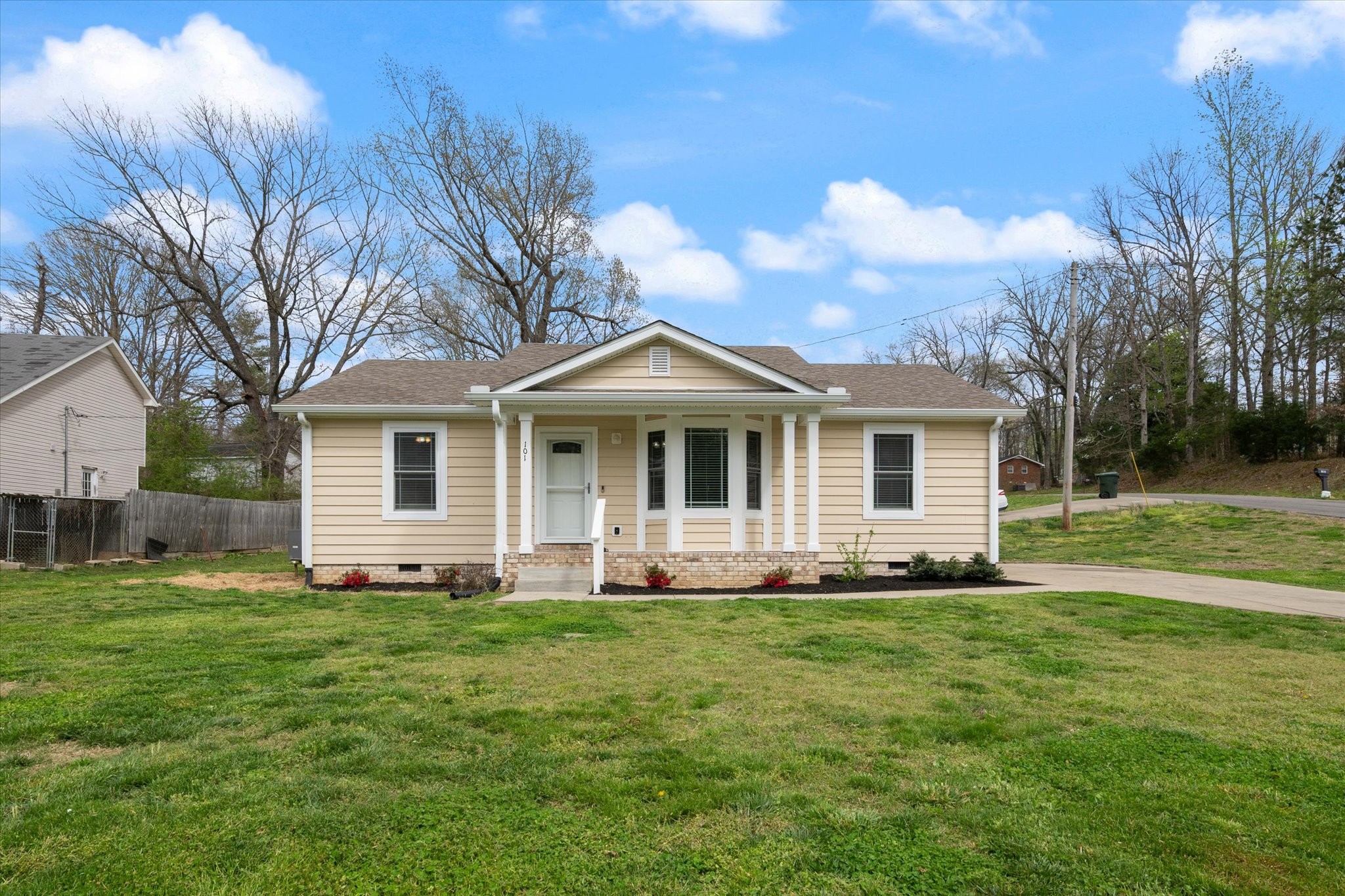 101 Birch Street Dickson, TN 37055 - Photo 2 of 18 a front view of house with yard and green space