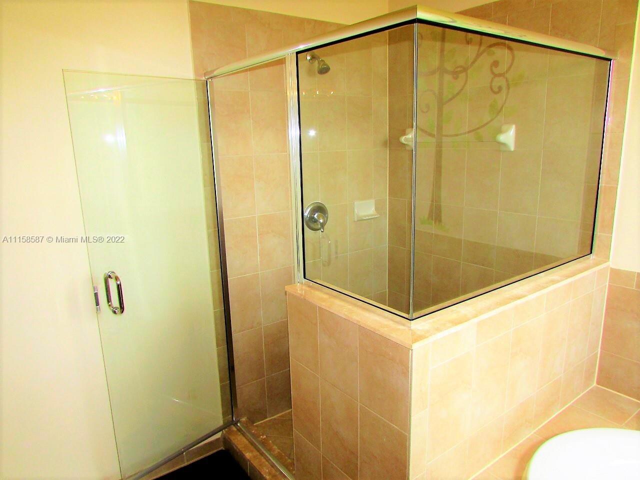 11759 Southwest 235th Street Homestead, FL 33032 - Photo 14 of 21 a bathroom with a shower and a sink