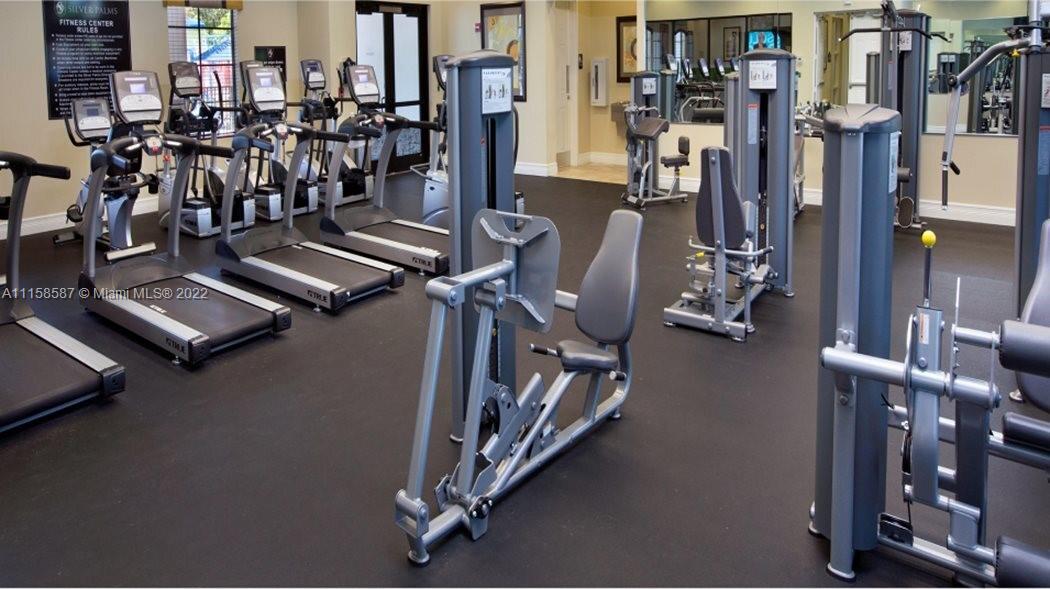11759 Southwest 235th Street Homestead, FL 33032 - Photo 2 of 21 a view of a room with gym equipment