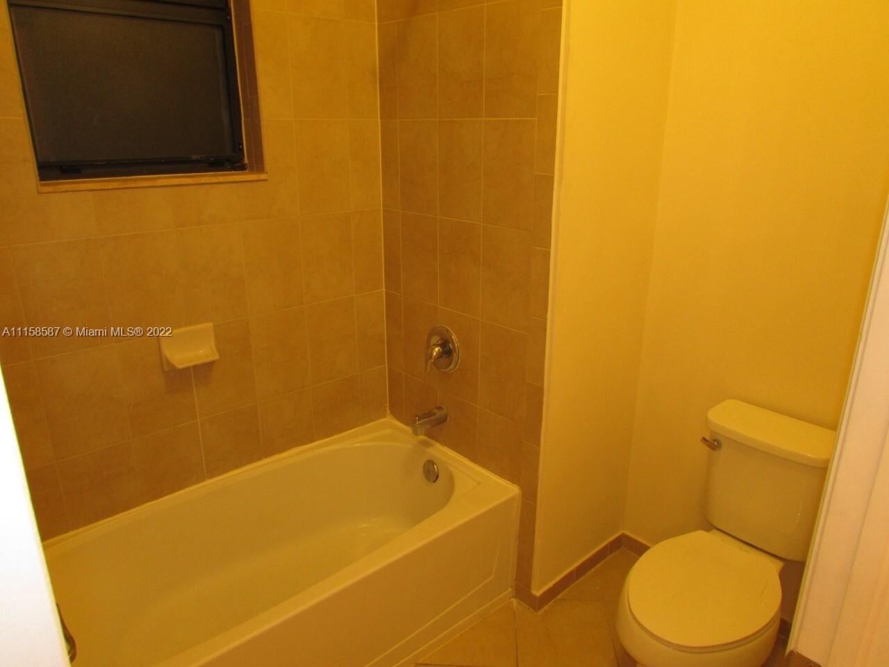 11759 Southwest 235th Street Homestead, FL 33032 - Photo 21 of 21 a bathroom with a toilet and a sink