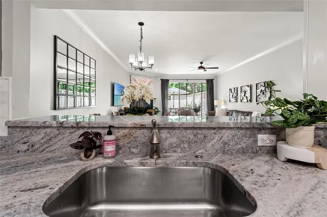 a kitchen with a sink and a window