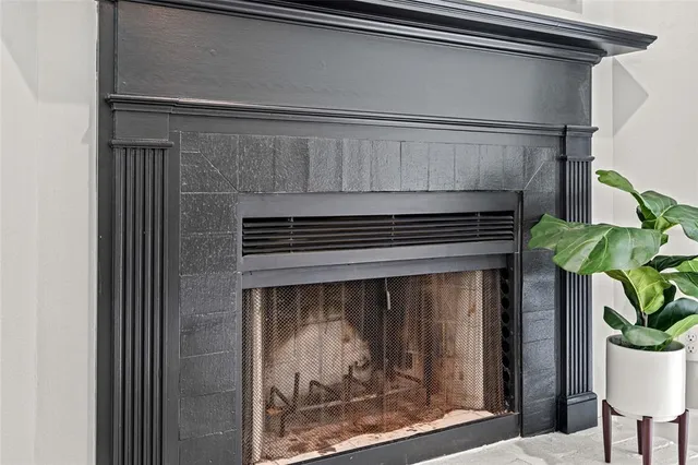 a close view of a fireplace in wooden floor