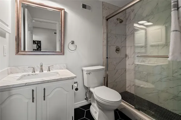 a view of balcony with wooden floor and outdoor seating