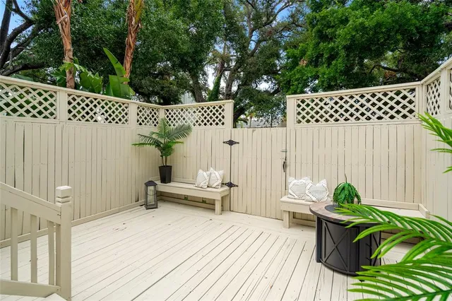 an aerial view of a house with a garden and yard