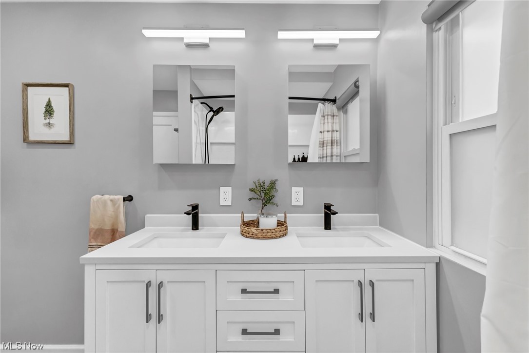 16404 West Park Road Cleveland, OH 44111 - Photo 16 of 41 2nd level bathroom with double sink vanity
