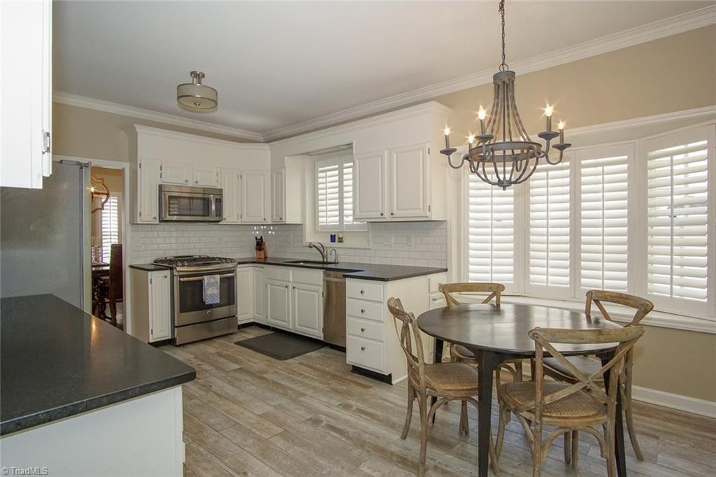 6037 Rittenhouse Road Winston-Salem, NC 27104 - Photo 10 of 30 The breakfast area has a charming bay window