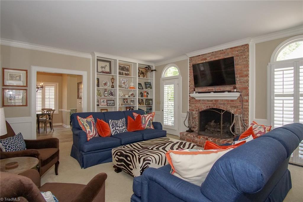 6037 Rittenhouse Road Winston-Salem, NC 27104 - Photo 13 of 30 Den also has access to the rear brick patio.