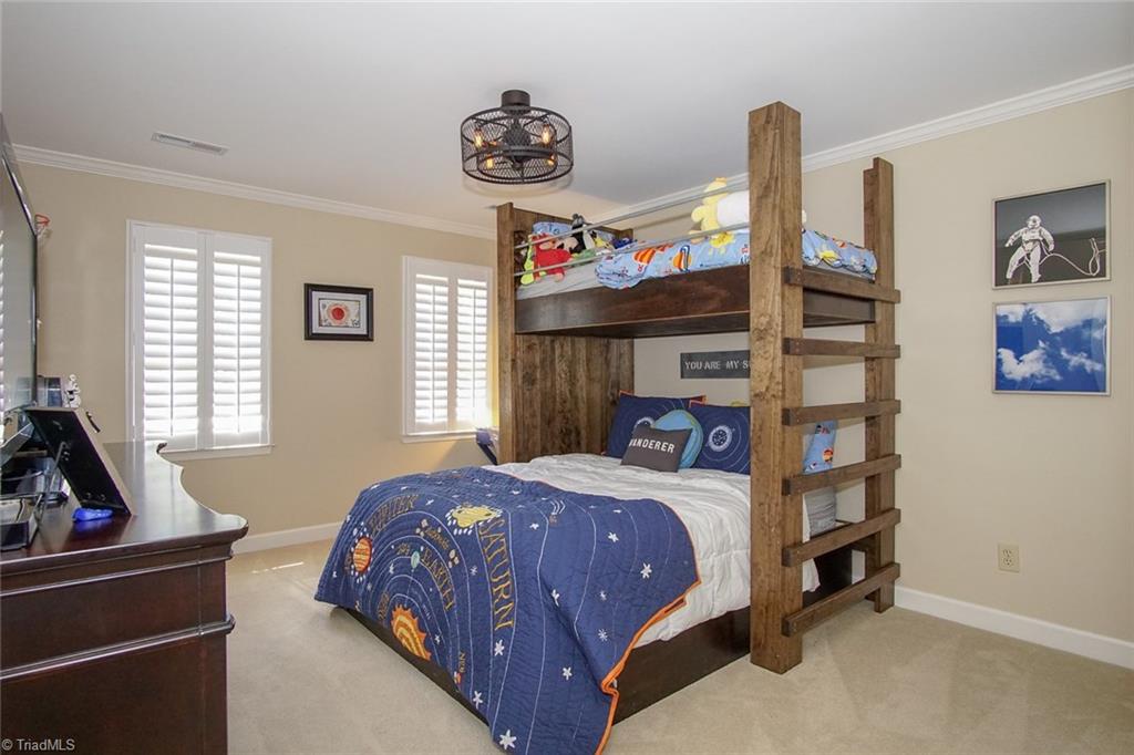 6037 Rittenhouse Road Winston-Salem, NC 27104 - Photo 22 of 30 Third large bedroom! Wide-slat custom plantation shutters in every room!