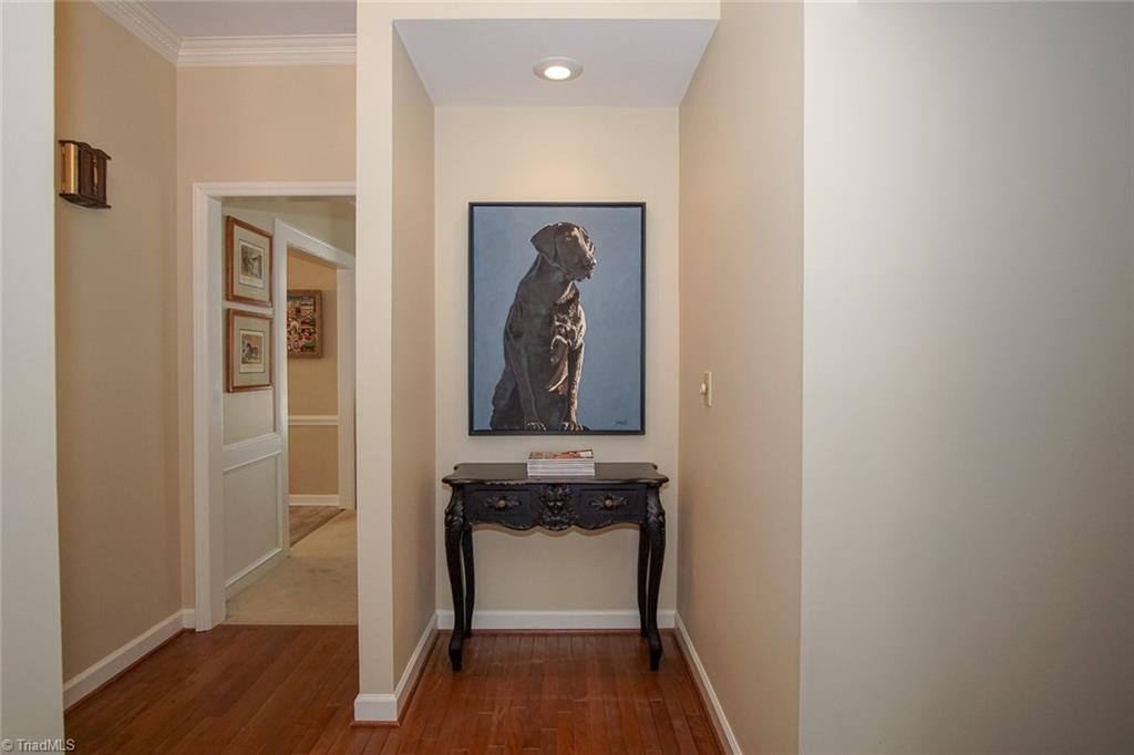 Thoughtful niche across from the front entry.  The to right is a darling powder room and laundry room.