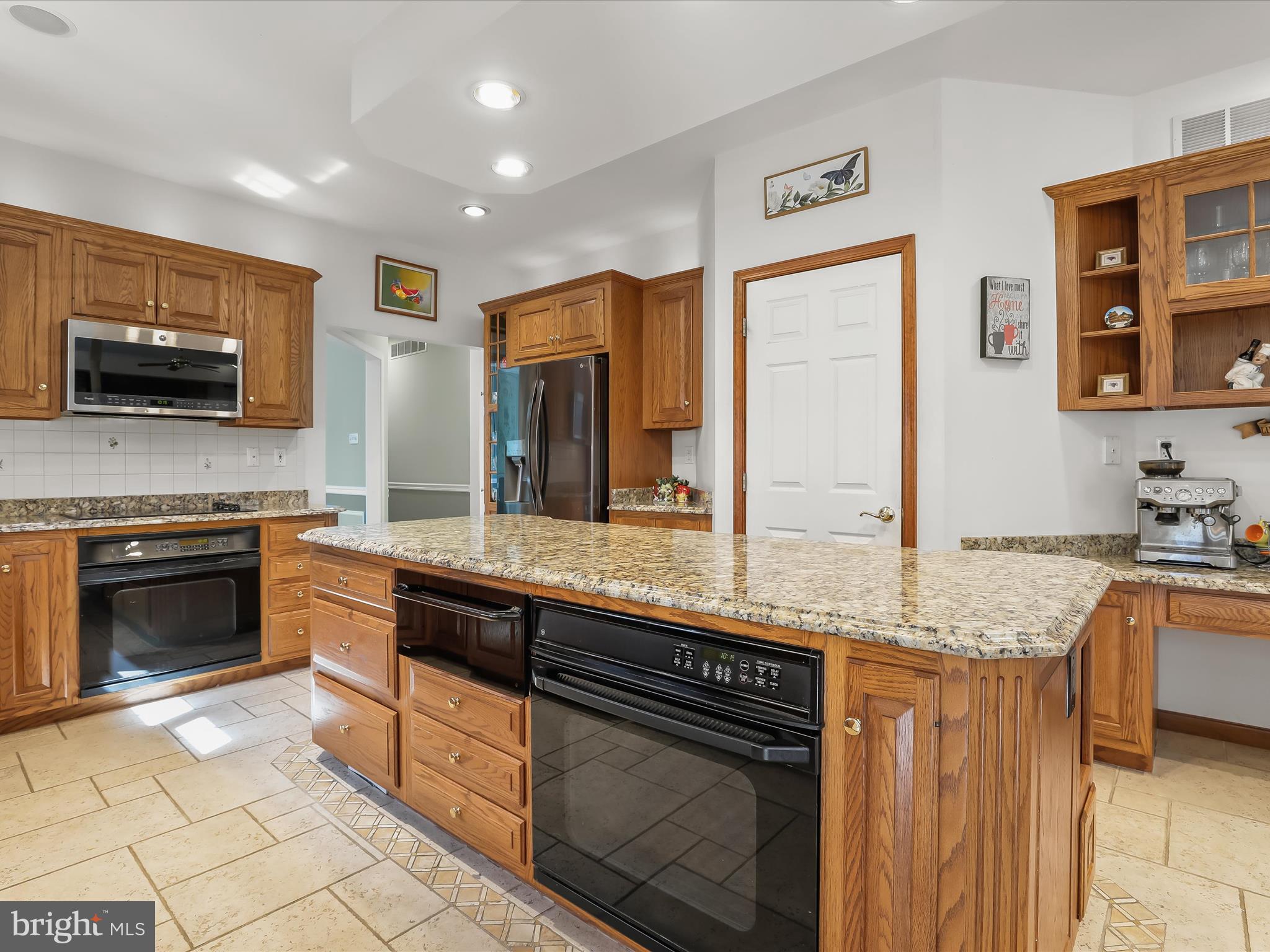 3155 Clarho Circle Finksburg, MD 21048 - Photo 12 of 70 a kitchen with stainless steel appliances granite countertop a stove a sink and a microwave
