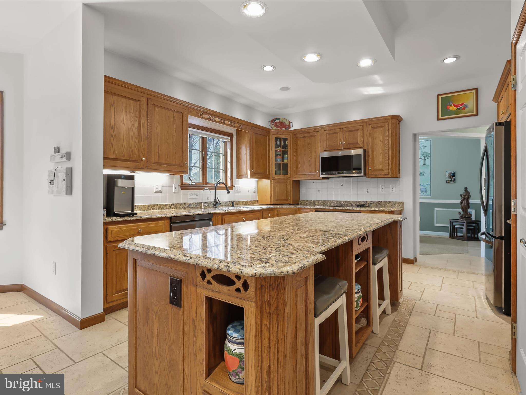 3155 Clarho Circle Finksburg, MD 21048 - Photo 14 of 70 a kitchen with stainless steel appliances granite countertop a sink and a refrigerator